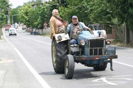 Husband and Wife on Tractor